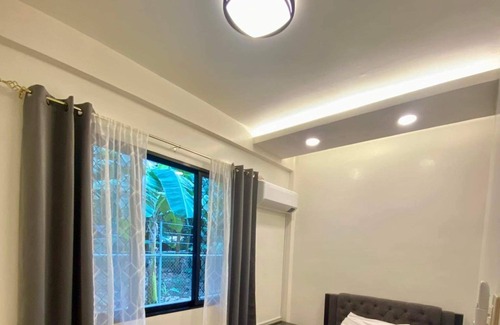 Dipolog House | Newly built modern house with garden view. We are pet-friendly!