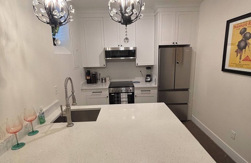 Wayne County Condo | Newly-built modern farmhouse condo available in Grosse Pointe Park!