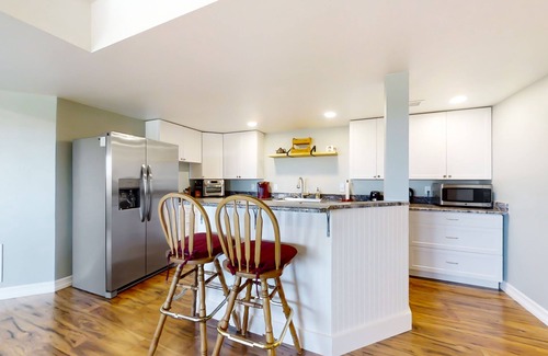 Fort Collins House | Newly built walkout basement with water views, patio, & Ping-Pong table