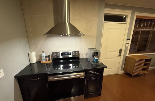 West Side House | Newly furnished Queen-bed Room2, shared bath and common space
