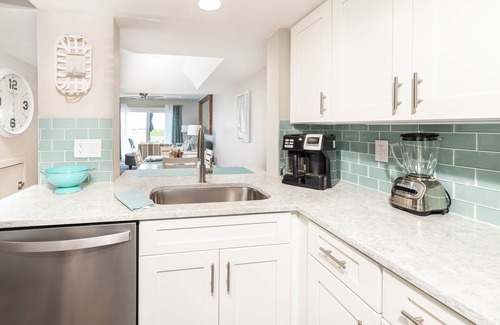 Oceanmarsh Subdivision Condo | Newly Listed Immaculate Condo - Distant Ocean Views - Pool and Beach Access
