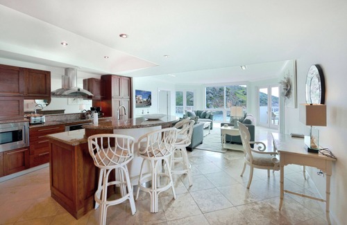 Oyster Pond Condo | Newly Renovated Luxury Ocean Front Condo* Stunning Lighthouse Escape!