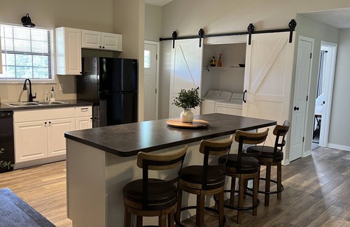 Monticello Cottage | Newly remodeled, handicap accessible overlooking pool , play area