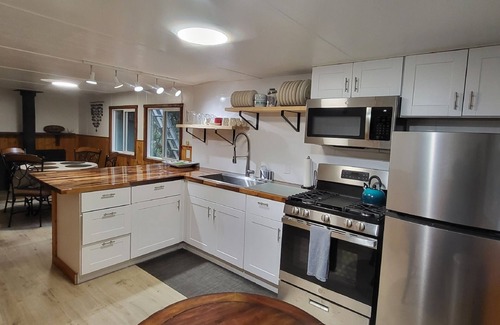 Marblemount Cabin | Newly remodeled off grid river cabin with full services including WiFi