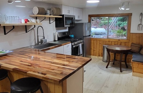 Marblemount Cabin | Newly remodeled off grid river cabin with full services including WiFi