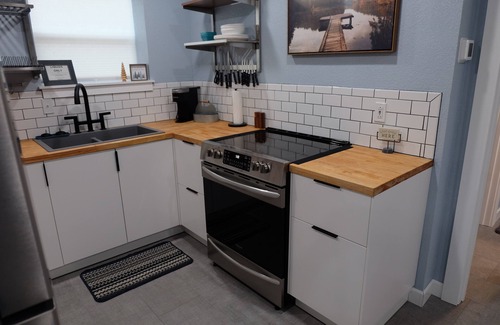 Russellville Apartment | Newly Remodeled Studio with huge garage space. Perfect for Boats, UTVs, & More