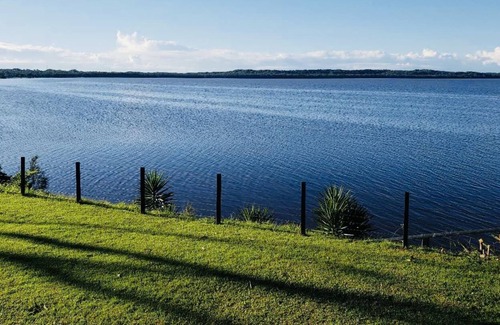 Toukley House | Newly renovated 4-bedroom lakefront home is perfect for your next family getaway