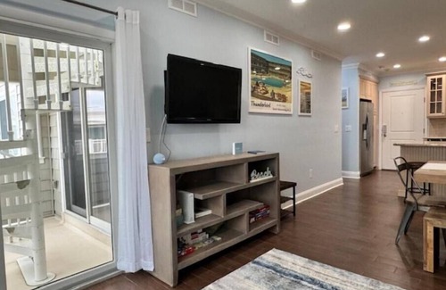 Normandy Beach Condo | Newly Renovated, Beachfront Family Oasis with Private Guarded Beach and Pool