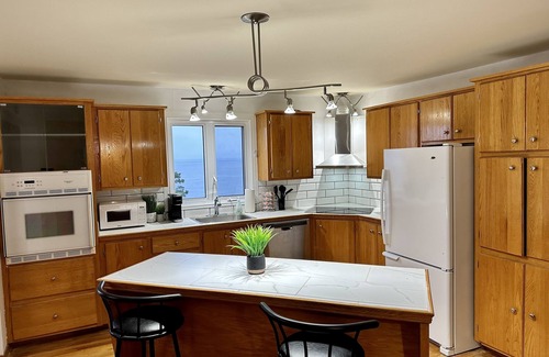 Pabos House | Newly Renovated Beach Home Steps Away from the Sea with 3 Bedrooms, queen beds.