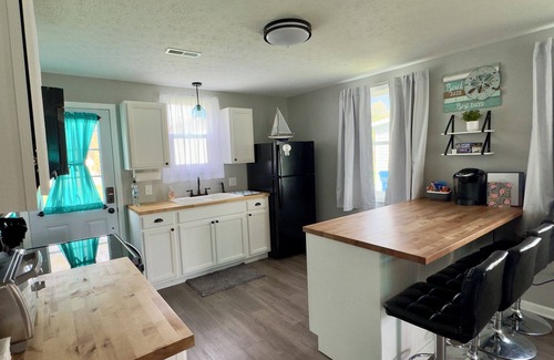 Vermilion Cottage | Newly renovated cottage just feet from the shore- pet friendly!
