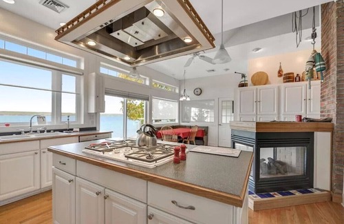 Romulus House | Newly Renovated East Shore Lakeside Ranch, Private Beach, Hot Tub, Boat Launch
