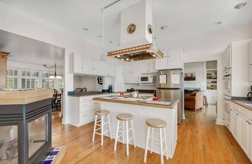 Romulus House | Newly Renovated East Shore Lakeside Ranch, Private Beach, Hot Tub, Boat Launch