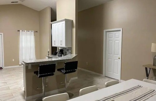 Crescent Lakes House | Newly renovated Lakefront Villa with private heated pool!