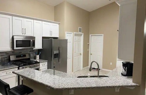 Crescent Lakes House | Newly renovated Lakefront Villa with private heated pool!