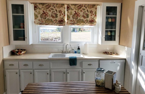Russell Springs House | Newly renovated 4th generation farmhouse sitting on 13 acres, centrally located