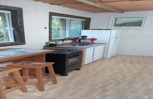 Praia da Fortaleza Condo | Next to lush nature, suite with TV, kitchen, wifi, barbecue, and garage