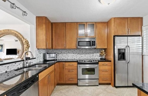 Redevelopment Area Condo | Nice 2-bedroom condo with AC in fabulous Naples with dock and pool ground floor!