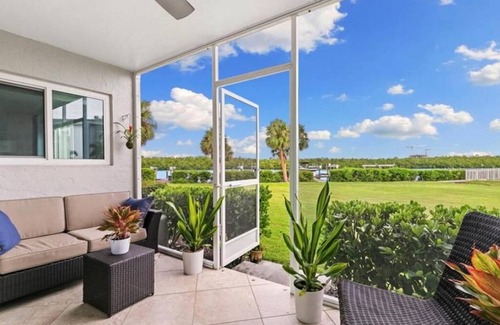Redevelopment Area Condo | Nice 2-bedroom condo with AC in fabulous Naples with dock and pool ground floor!