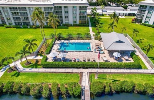 Redevelopment Area Condo | Nice 2-bedroom condo with AC in fabulous Naples with dock and pool ground floor!