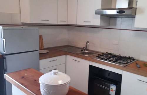 Rosignano Marittimo Villa | Nice apartment in villa for 10 guests with pool, TV, pets allowed and parking