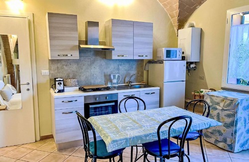 Cecina Apartment | Nice apartment for 3 guests with pool, WIFI, A/C, TV, pets allowed and parking