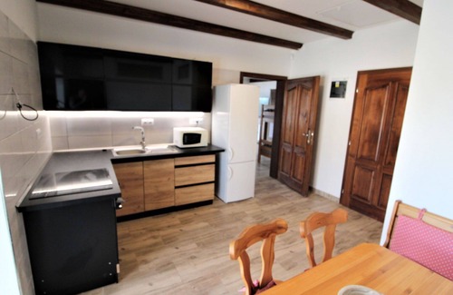 Zupanovice Apartment | Nice apartment for 9 people with WIFI, pool, TV, patio, pets allowed and parking
