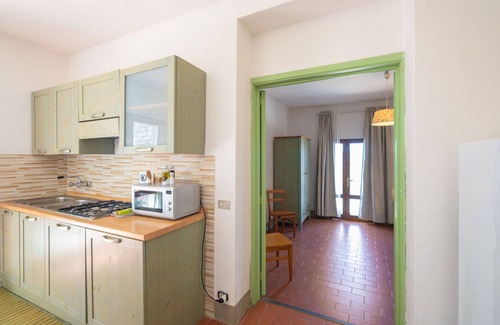 Montebonello Apartment | Nice apartment for 4 people with A/C, WIFI, pool, TV, pets allowed, panoramic view and parking