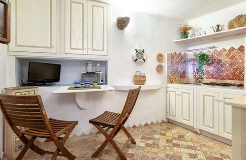 Capo d'Orso Apartment | Nice apartment for 2 guests with A/C, TV and pets allowed