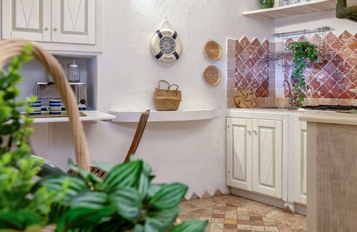 Capo d'Orso Apartment | Nice apartment for 2 guests with A/C, TV and pets allowed