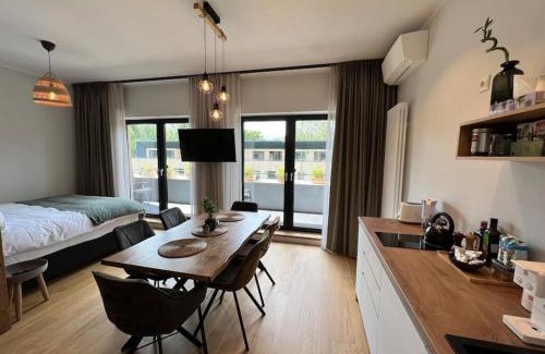 Engure Apartment | Nice apartment with a balcony by the sea.