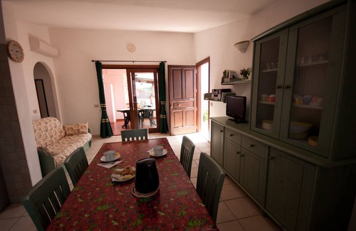 Monte Petrosu Apartment | Nice apartment with roof terrace in an elegant complex with swimming pool