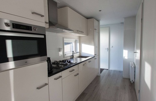 De Bult House | Nice chalet with dishwasher, surrounded by forest