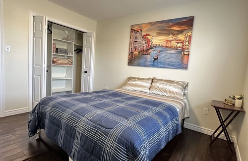Grand River South House | Nice home with cozy living room, large backyard, bedroom and bathroom.
