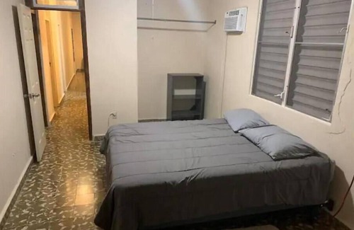 Mayaguez Pueblo House | Nice House near University of Mayaguez with covered and gated car parking.