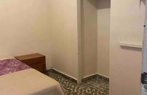 Mayaguez Pueblo House | Nice House near University of Mayaguez with covered and gated car parking.
