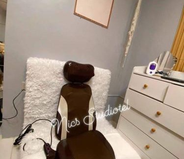 Naga Apartment | Nics Studiotel - Massage chair