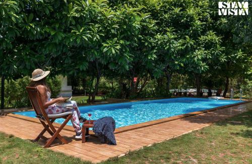 Karjat Villa | Nivaant Farms & Cottages - Nestled in lush greenery, offering a Swimming pool, Orchard, Jacuzzi & A spacious lawn with gazebo