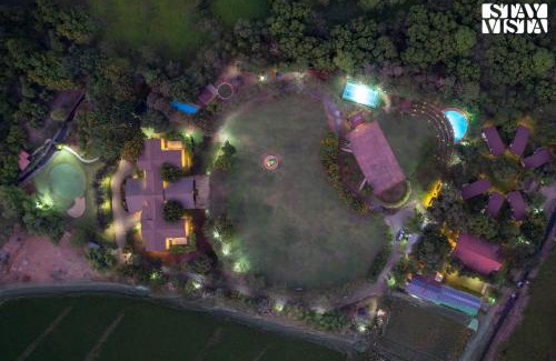Karjat Villa | Nivaant Farms & Cottages - Nestled in lush greenery, offering a Swimming pool, Orchard, Jacuzzi & A spacious lawn with gazebo