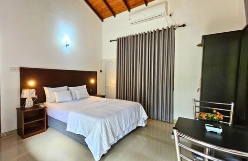 Polonnaruwa Bed & Breakfast | Niwahana Holiday Resort - Double Room with Park View 1