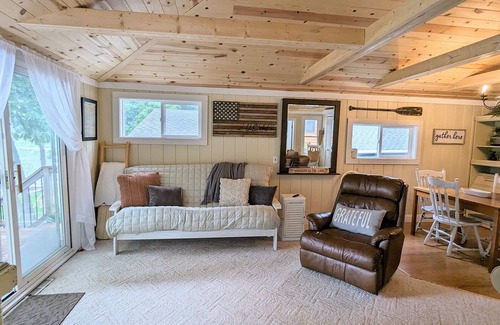 Solon Township House | No wake lakefront cottage with tiered decks and a quiet, friendly neighborhood