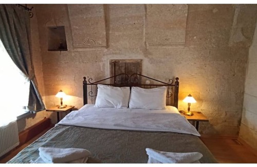 Goreme House | Nomads - Traditional Arch Stone room at the center