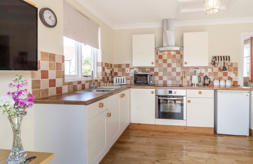 Bressingham Cottage | NORBANK GARDEN STUDIO, with a garden in Bressingham
