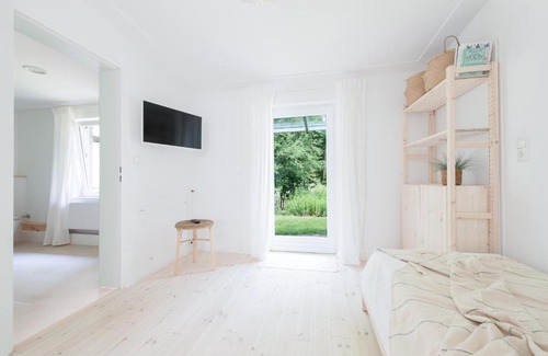 Danisch Nienhof Apartment | Nordic Bo -Wellen Wald und wilde Küste- Strandnahe Doppelhaushälfte mit Waldterrasse