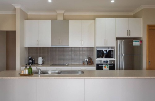 Koonya House | Norfolk Bay Retreat - views over the sea and vines