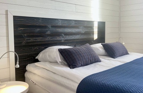 Mjallom Hotel | Norrfällsvikens Rum & Kök