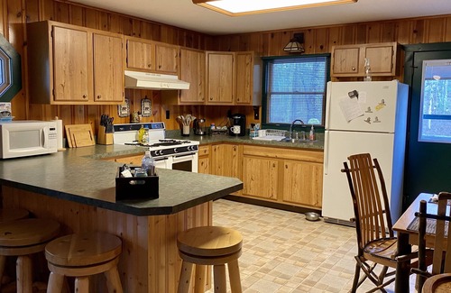Manistee House | North Country Cabin - Secluded cabin on 20 acres