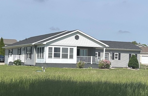 Coldwater House | North Lakes chain waterfront home with private dock access.