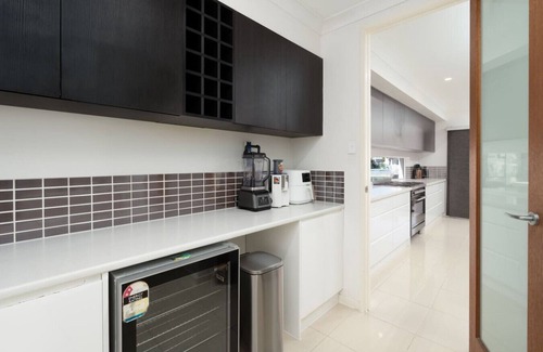 Biggera Waters House | North Quay Waterfront Family Holiday Home + Pool