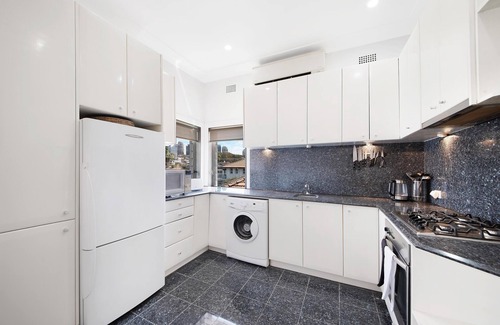 Kirribilli Apartment | North Sydney - HSNS1 - High Street - ChatGPT said: Harbourfront 1BR with Stunning Views Shared Garden in North Sydney