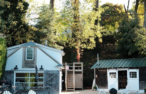 Northport Cottage | Northport quaint restored Boathouse with sunset views!